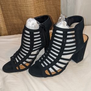 Cute black laser cut heels zip up